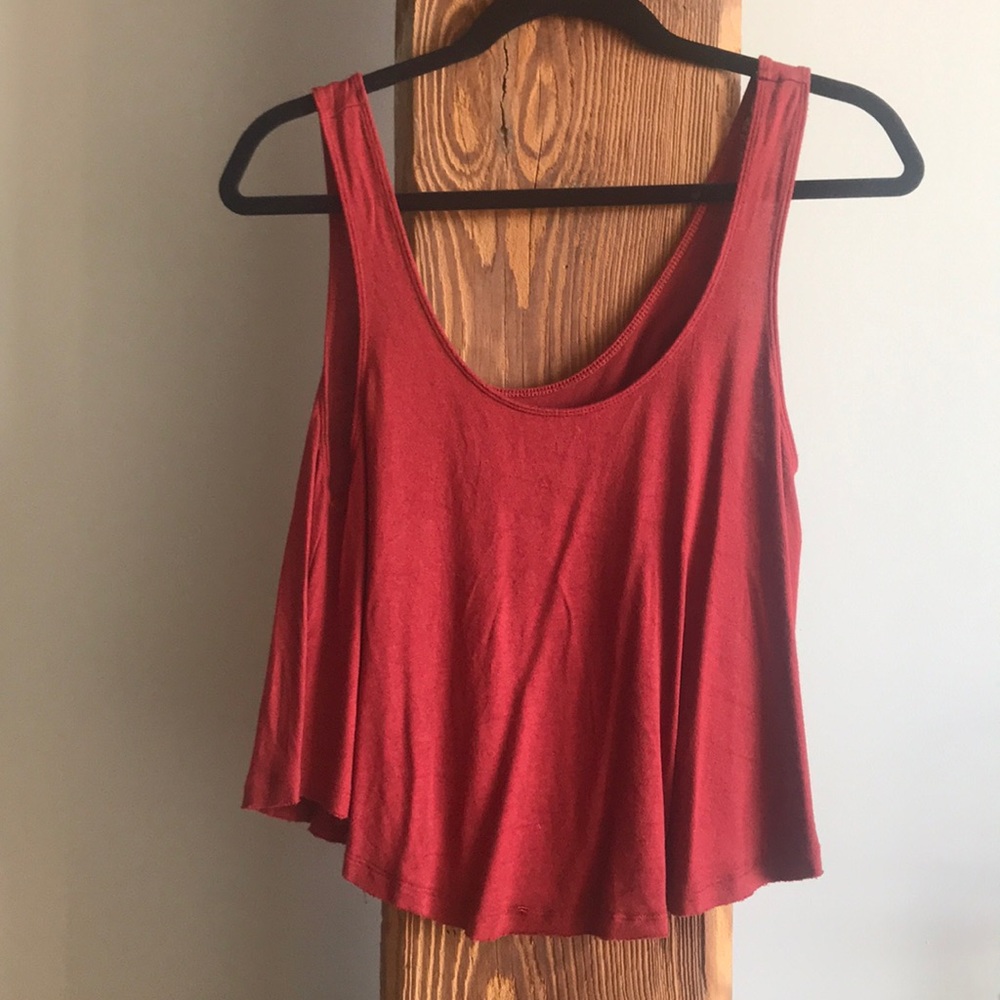 Cropped swing tank